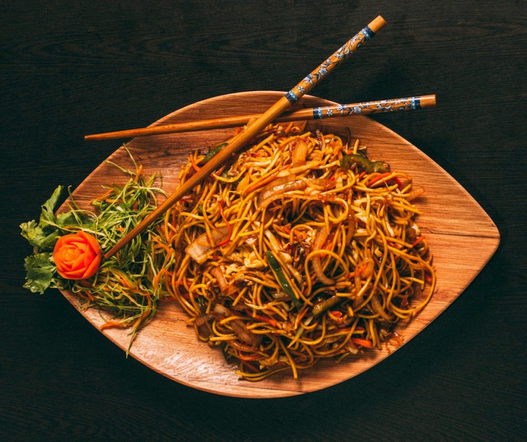 pasta dish on brown ceramic plate